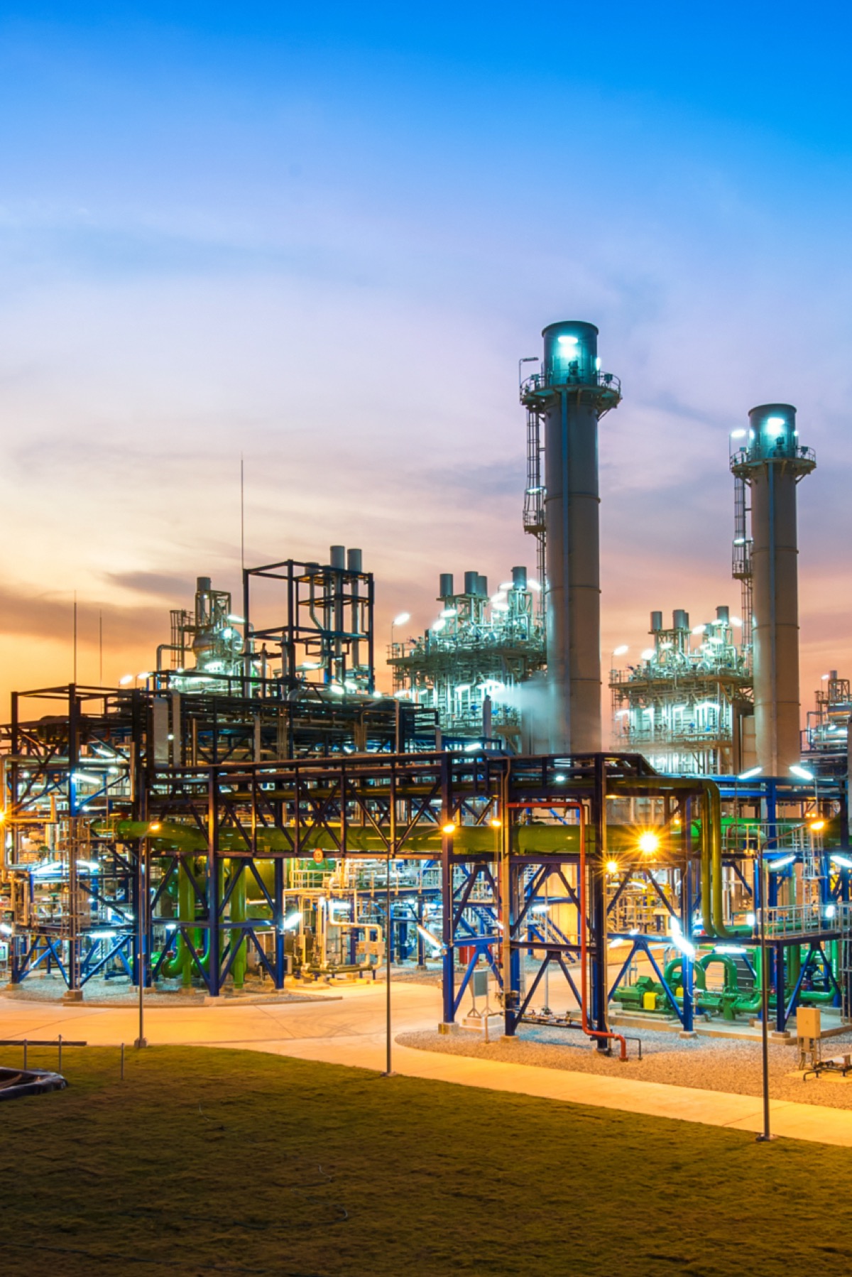Night view of industrial facilities in San Diego, representing the industries TREMO serves with rebar processing in the region