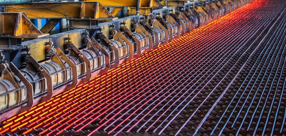 Rebar processing at TREMO's facility, showcasing reinforced and aligned bars ready for cutting and bending