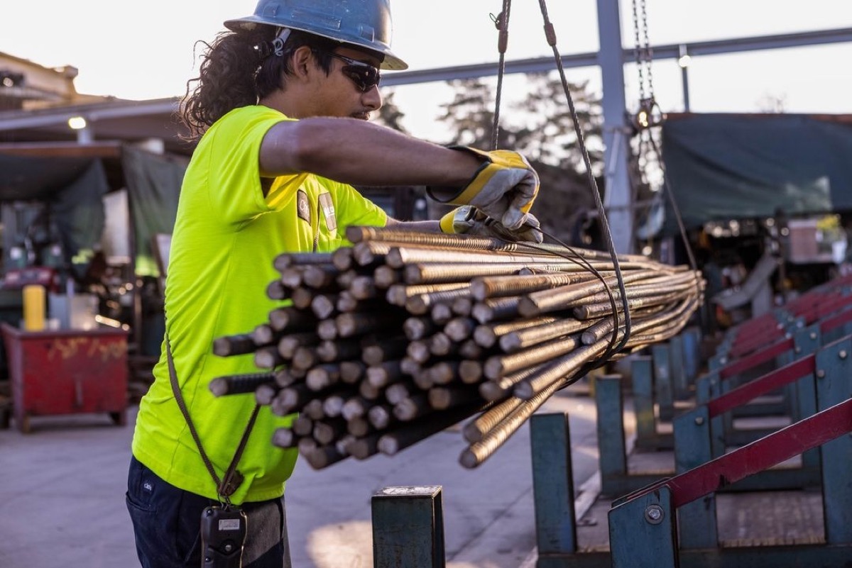TREMO quality inspector examining the finish and alignment of rebar on-site